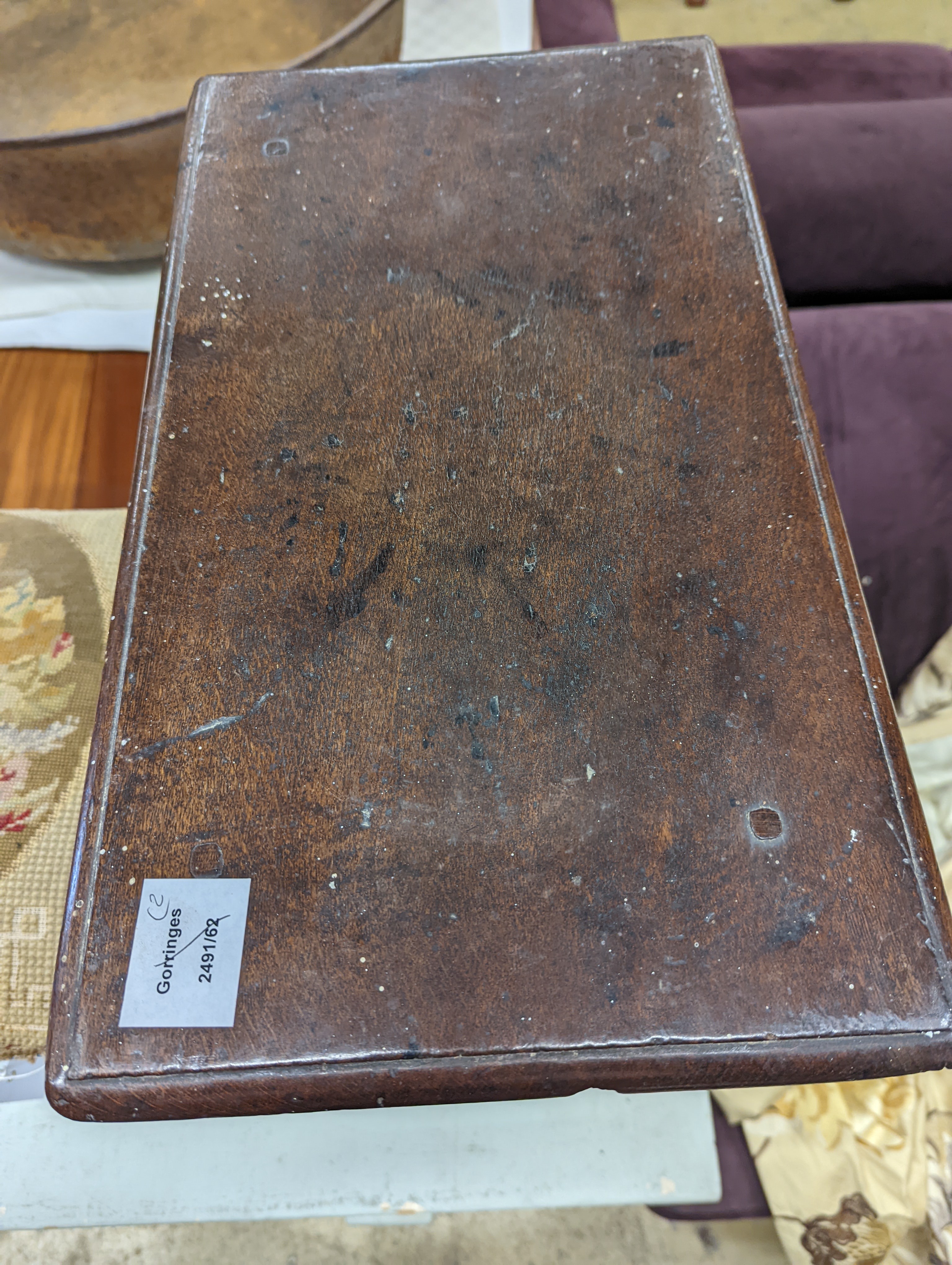A 17th century style oak joint stool, width 46cm, depth 26cm, height 46cm and a George III stool with Victorian needlework seat, length 33cm